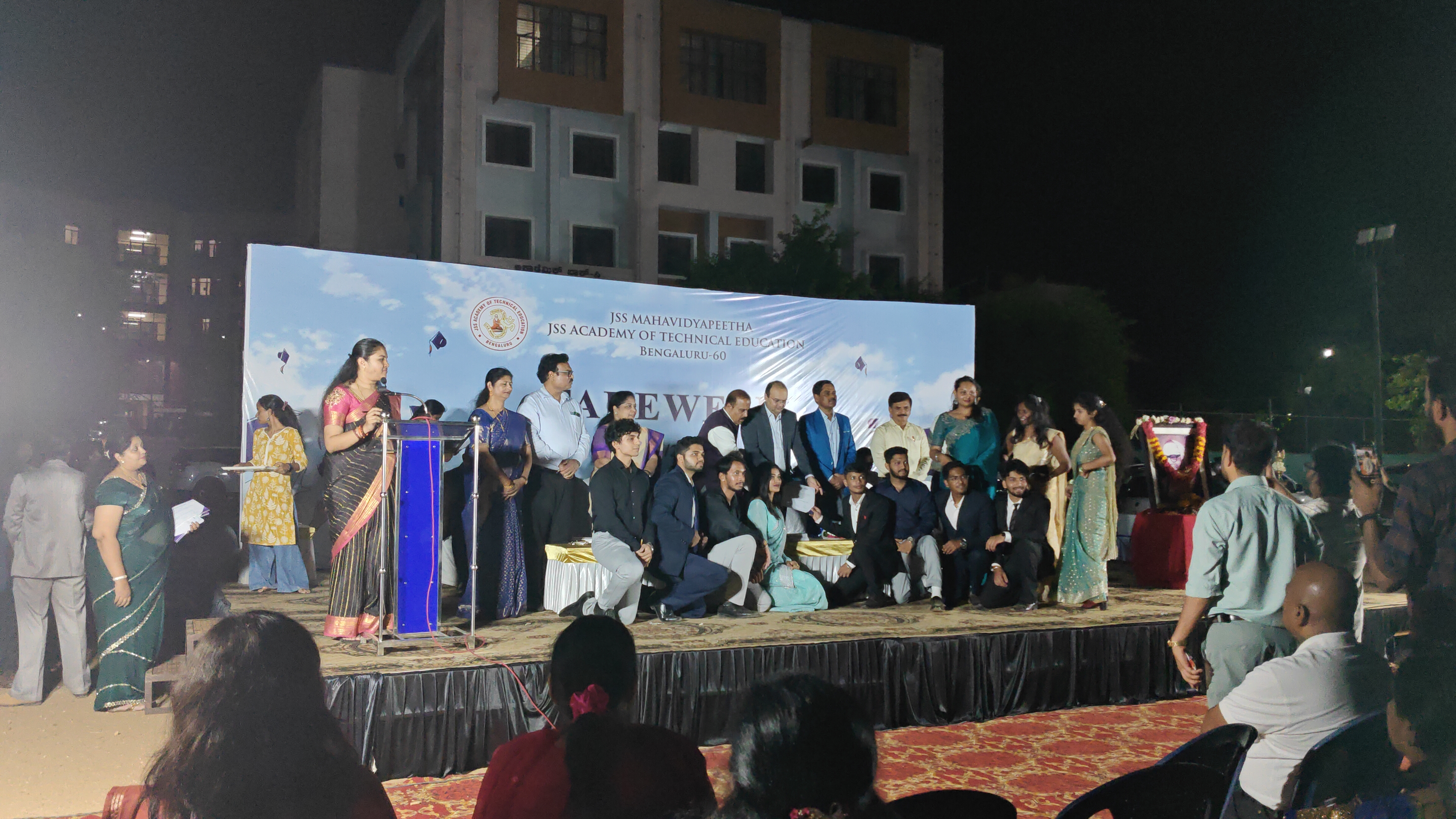 Award felicitation on stage receiving first place and cash prize with faculty guides and teammates.