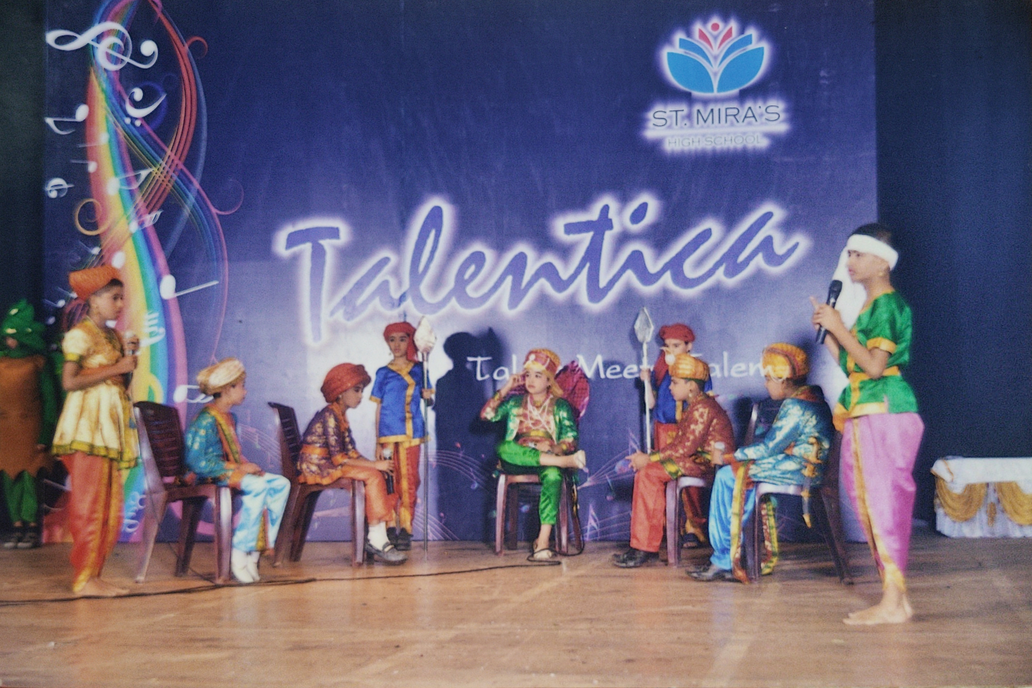 Portraying Emperor Akbar seated on the throne presiding over the royal court during 'Talentica'.