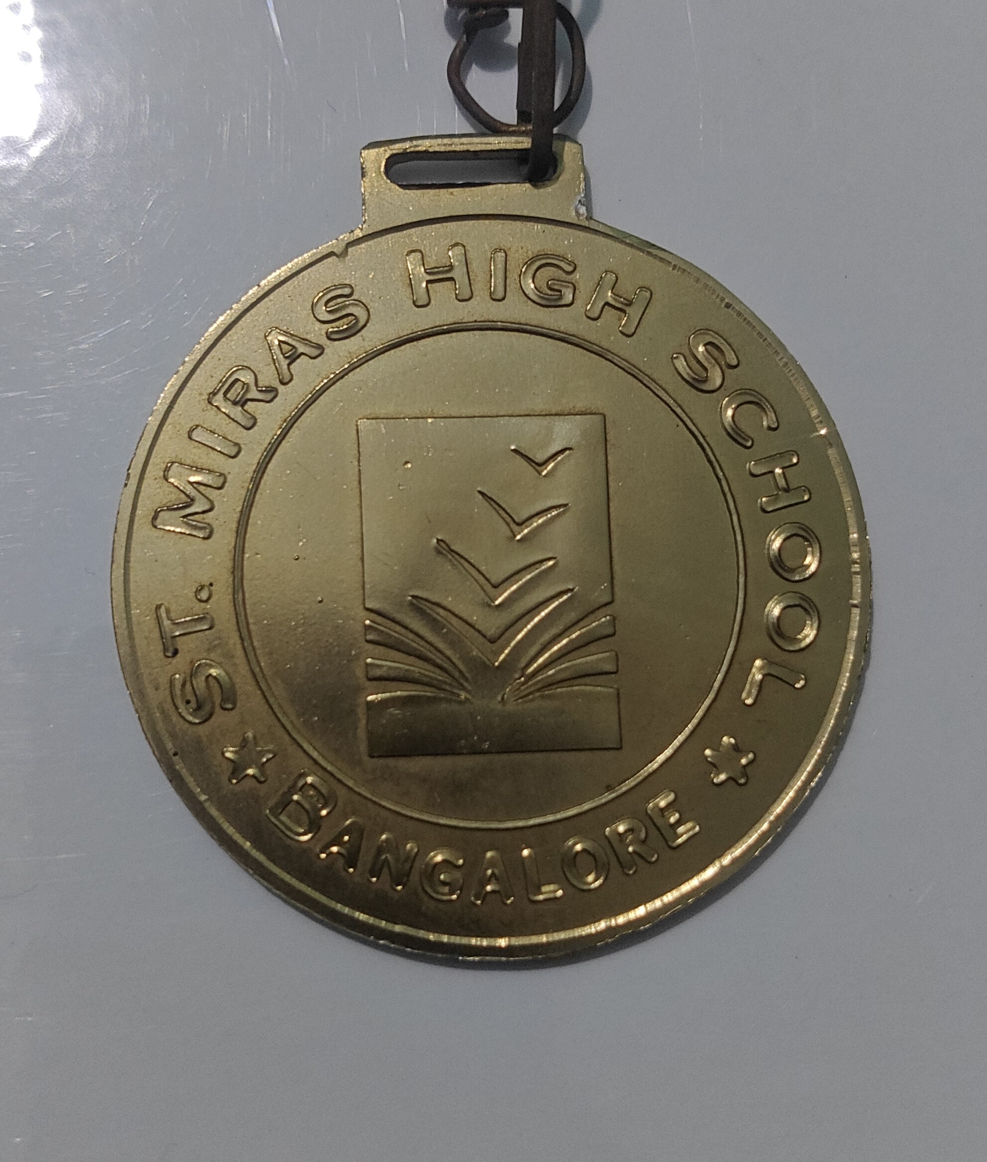 Gold medal earned at St. Mira's High School Bangalore in Grade 3.