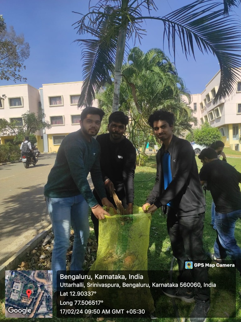 Actively collecting waste and cleaning campus surroundings during the Swachh Bharat Abhiyan drive in Uttarahalli, Bengaluru.